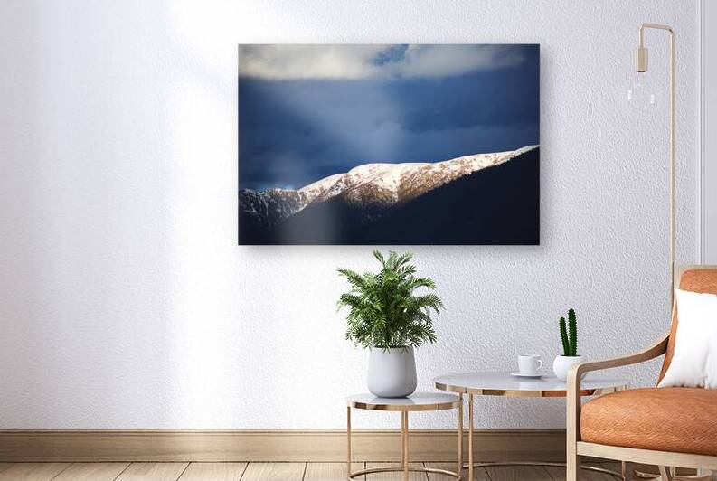 Sunlit Mountain With Dark Clouds by Joy Watson