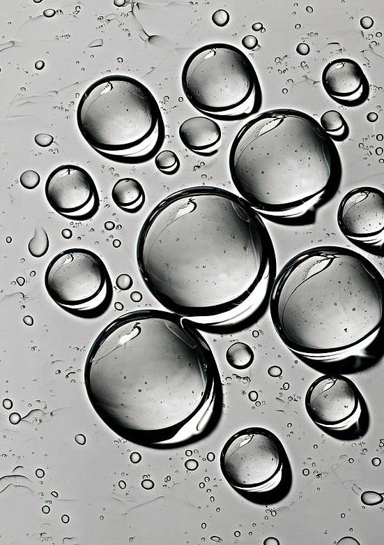 Water and air bubbles isolated on white background by Lupu Andrei