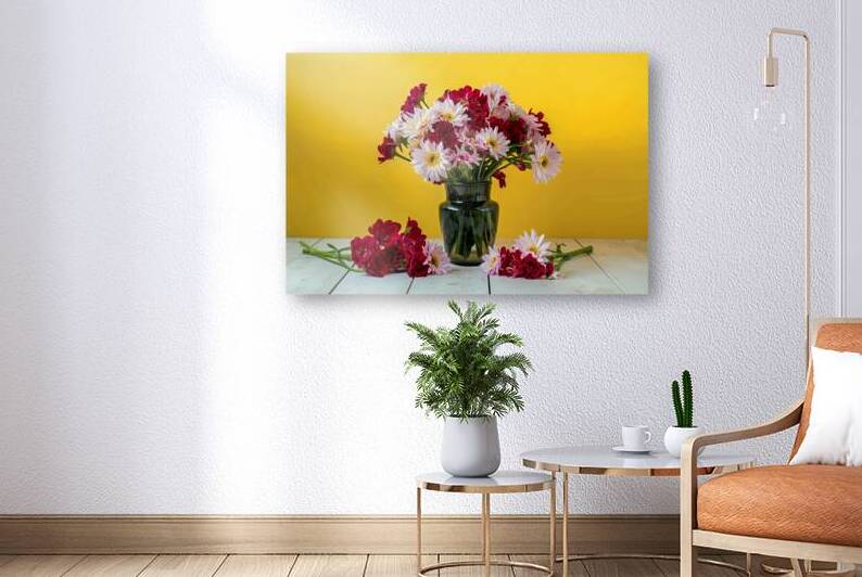 flowers in vase and on a table on yellow background by Lupu Andrei