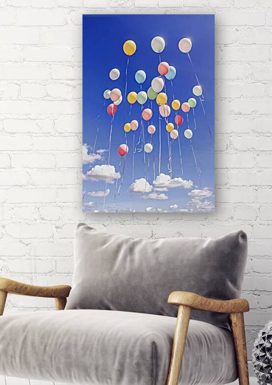 summers day with a host of coloured balloons floating into the blue sky by Lupu Andrei