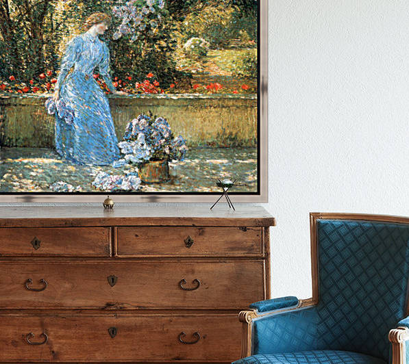 Woman in park by Hassam