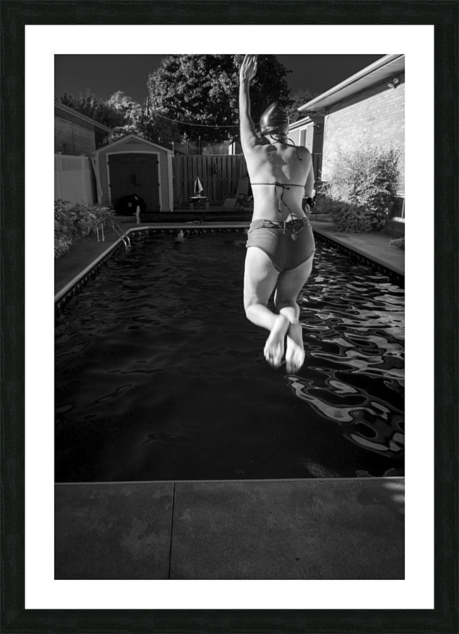 Jumping into the pool Picture Frame print