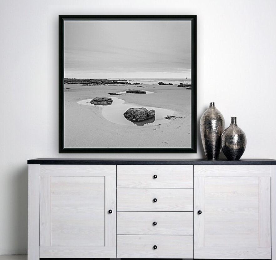 Rock pools on a sandy beach Reproduction