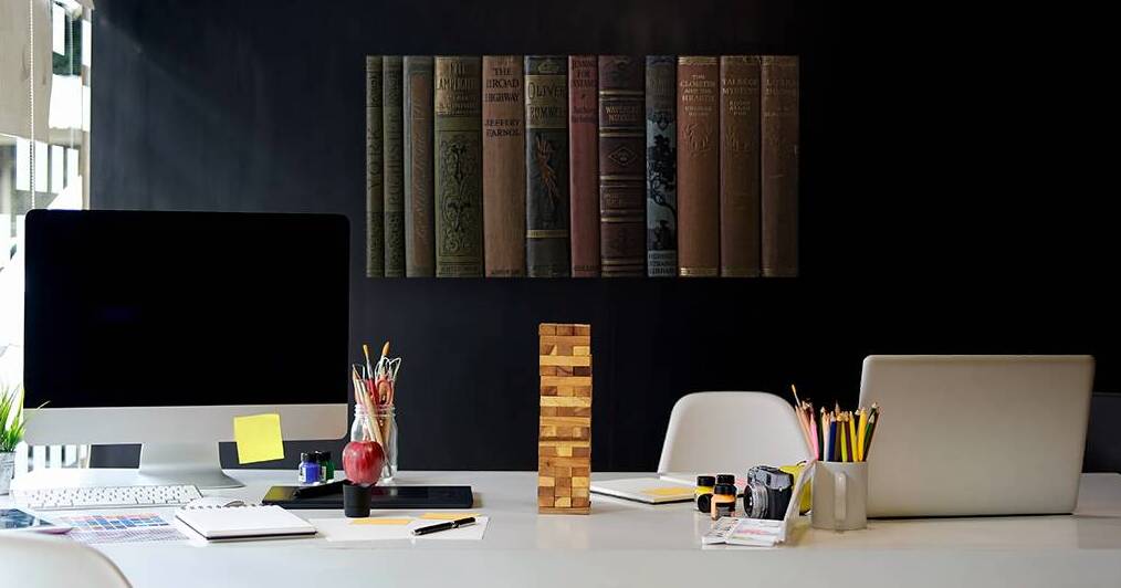 Old books on a shelf by Assaf Frank