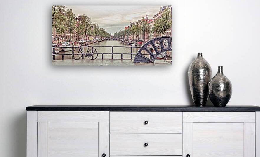 Canal through Amsterdam city by Assaf Frank