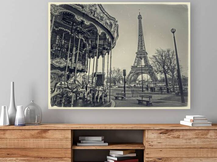 Carousel with the Eiffel tower in the background by Assaf Frank