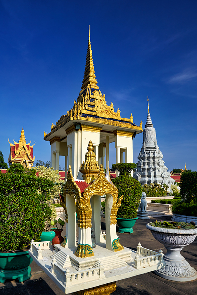 Golden temples and a grey stupa under a clear blue sky. Digital Download