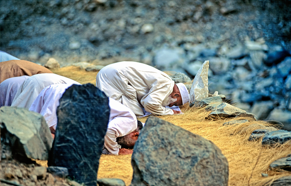 Muslim men pray towards Mecca in Pakistan during prayer time Digital Download