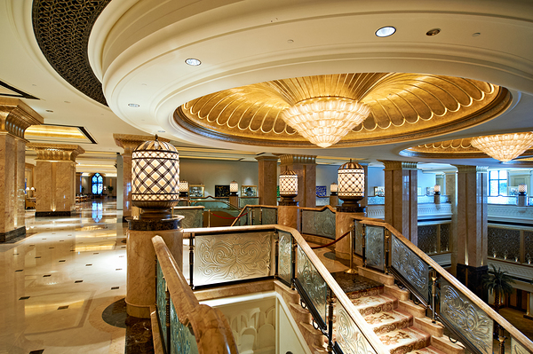 Opulent hotel lobby with grand staircase and golden chandeliers. Digital Download