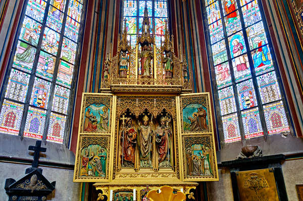 Ornate golden altarpiece and vibrant stained glass windows in a  Digital Download