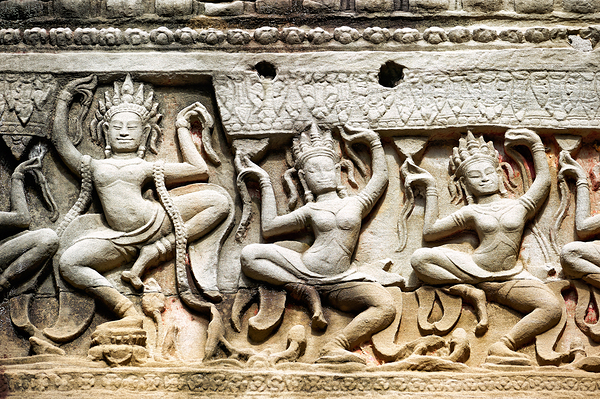 Ancient stone carvings of dancing Apsaras on a temple wall. Digital Download
