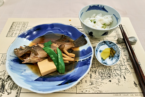 Enjoying traditional Japanese cuisine at a restaurant in Miyajim Digital Download