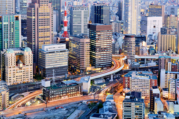 Osaka financial district at dusk with city lights and busy stree Digital Download