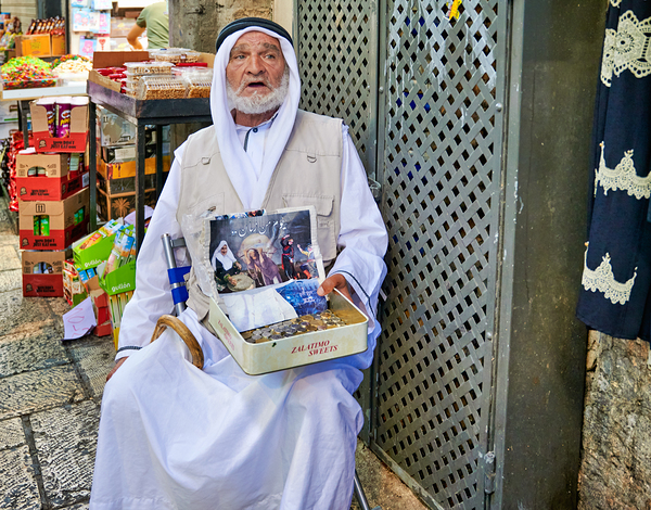 Beggar in the old city of Jerusalem seeks help from passersby Digital Download