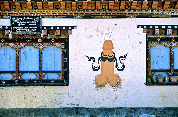 Phallus painting on a building wall with windows and shop sign. Digital Download