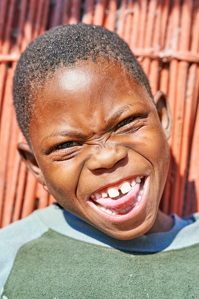 Joyful child smiles in Kavango Region of Namibia Digital Download