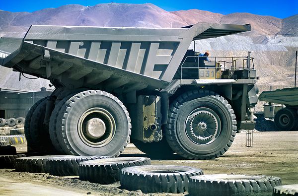 Giant mining dump truck in a dusty mountain quarry. Digital Download