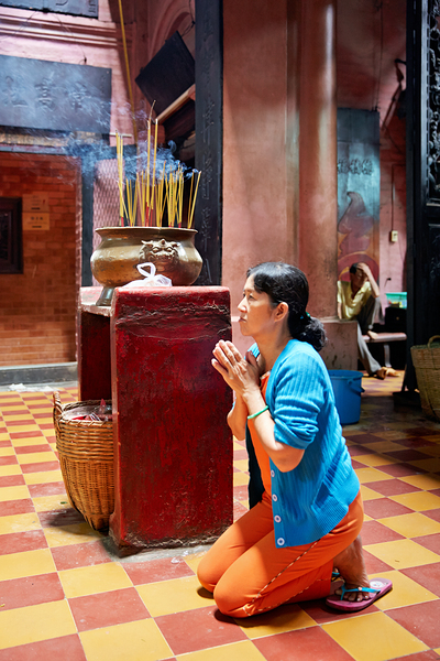 Woman prays at a temple in Ho Chi Minh City Vietnam Digital Download