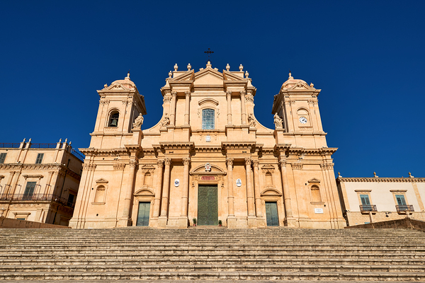 Noto Cathedral stands tall in Sicily under a clear blue sky Digital Download
