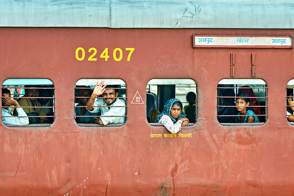 People travel on a train in Rajasthan India during the day Digital Download