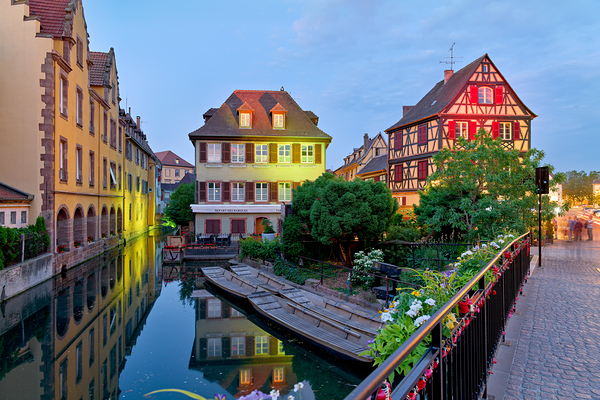 Timber framed houses and visitors in Colmar canals at dusk Digital Download