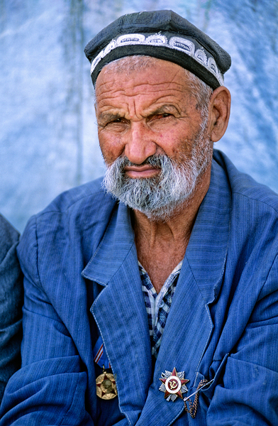Elderly man in Bukhara Uzbekistan engages in local culture Digital Download