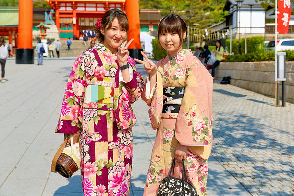 Young women enjoy Fushimi Inari Taisha Shrine in Kyoto Japan Digital Download