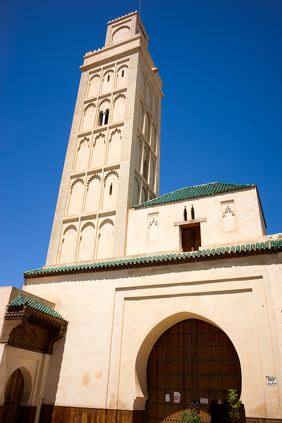 Visit Meknes mosque in Morocco with a tall tower and clear sky Digital Download