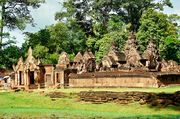 Ancient stone temple complex surrounded by lush jungle and water Digital Download