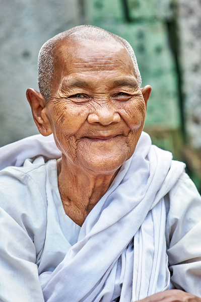 Smiling elderly Asian woman in white robe. Digital Download