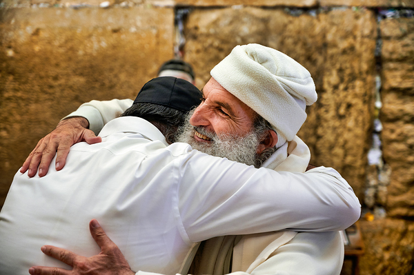 Men embrace each other at the Wailing Wall in Jerusalem Digital Download