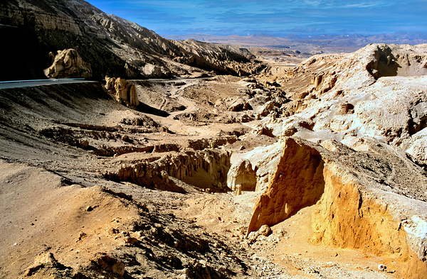 Dramatic arid mountain landscape with a winding road. Digital Download