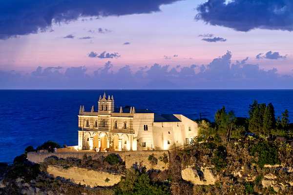 Tropea offers views of the sea and buildings at sunset in Calabr Digital Download