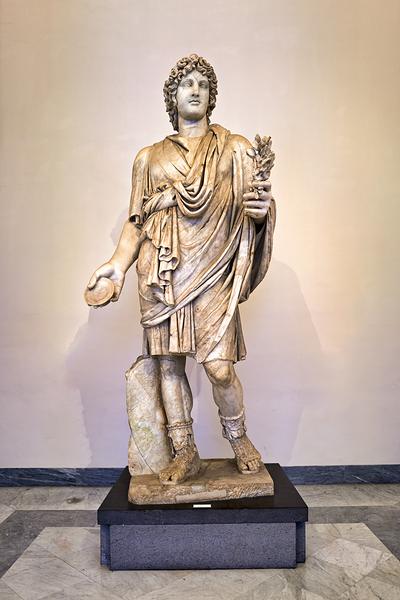 A Roman statue stands in the National Archaeological Museum of N Digital Download