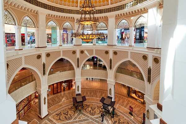 Explore grand shopping mall interior in Dubai with multiple leve Digital Download
