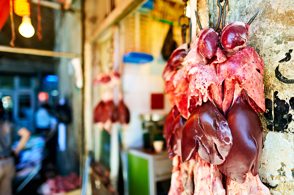 Butcher displays meat at souq in Aleppo Syria during the day Digital Download