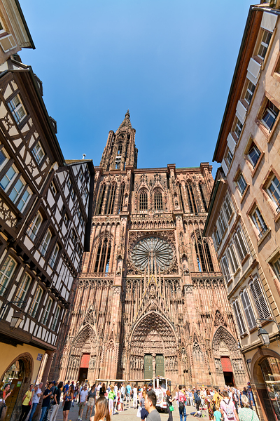 Tourists gather at Strasbourg Cathedral in Alsace on a sunny day Digital Download