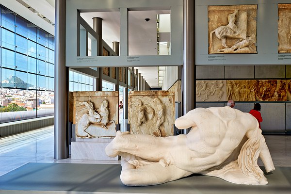 Visitors explore sculptures at Acropolis Museum in Athens Greece Digital Download