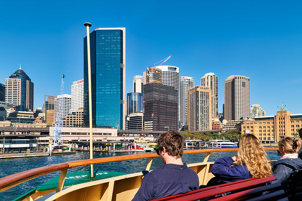 Ferry passengers enjoy city skyline view. Digital Download