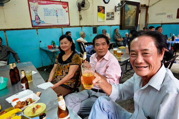 People enjoying time together in a cafe in Ho Chi Minh City Digital Download