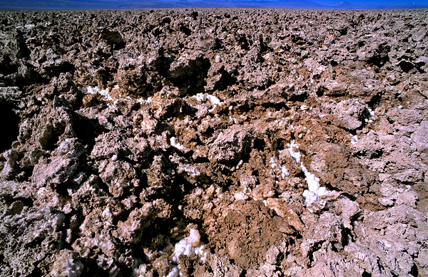Salt encrusted desert floor under a bright blue sky. Digital Download