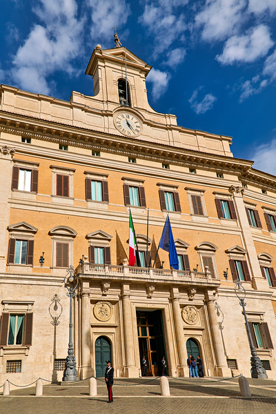 Palazzo Montecitorio stands in Rome Italy during a clear day Digital Download