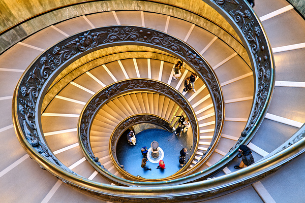 Visitors walk down Bramante staircase in Vatican Museums in Rome Digital Download