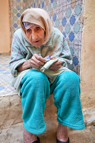 Beggar sitting in Fez Morocco with worn clothes and hands Digital Download
