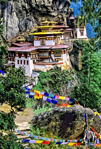 Iconic Bhutanese monastery on a cliff surrounded by prayer flag Digital Download