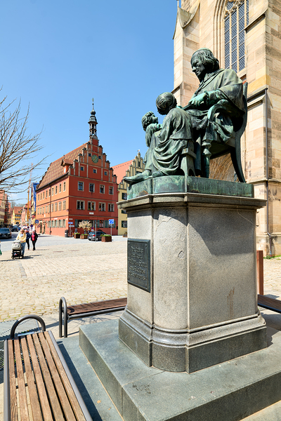 Visitors explore Dinkelsbuhl old town and historical statue Digital Download