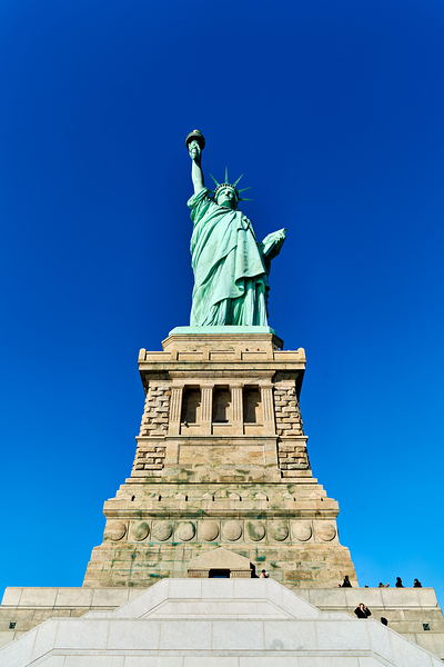 Statue of Liberty stands proudly on Liberty Island in Manhattan Digital Download
