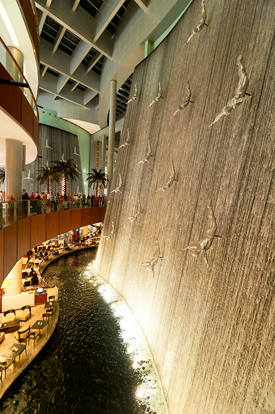 Indoor waterfall with diving sculptures and dining in Dubai UAE Digital Download