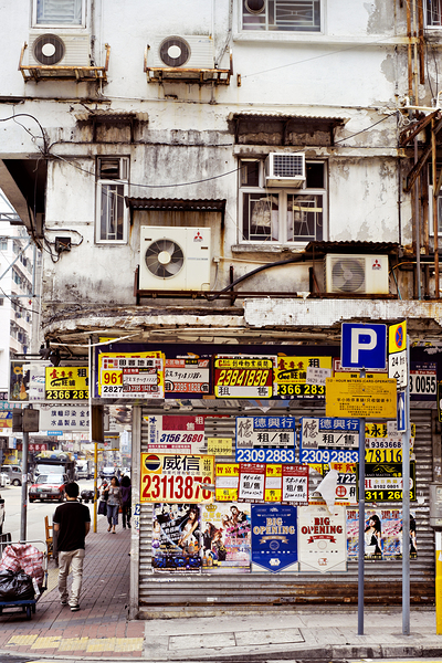 Busy street in Hong Kong shows old building and pedestrians Digital Download