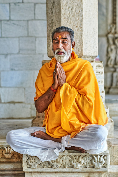 Man prays in Jain temple in Ranakpur Rajasthan during the day Digital Download